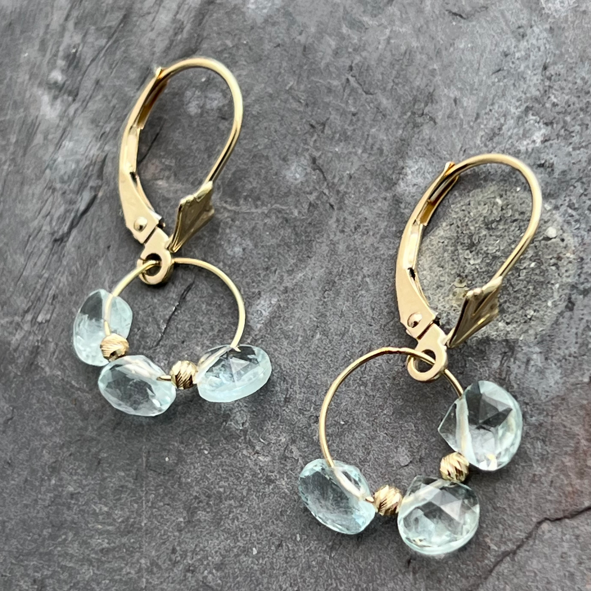 Handmade blue topaz 14K gold earrings at Garden of Silver in Westhampton Beach, NY www.gardenofsilver.com