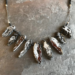 Terra Necklace handmade by Garden of Silver with geodes and sterling silver.
